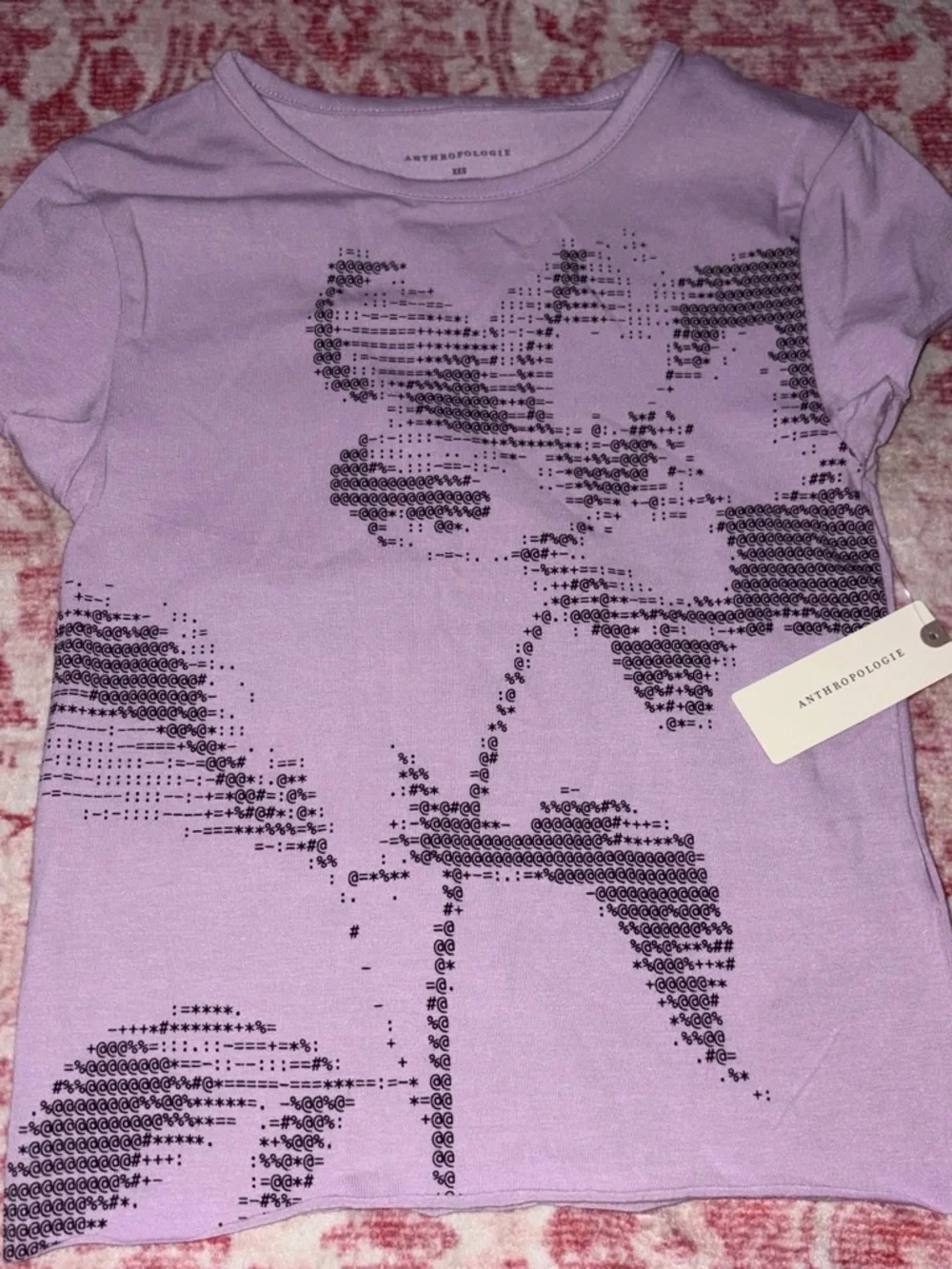 Anthropologie Lavender Short Sleeve Tee with Black Floral Dot Graphic